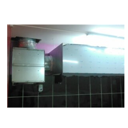 Photo d'exemple de système d'extraction de ventilation avec moteur de hotte déporté dans un caisson.